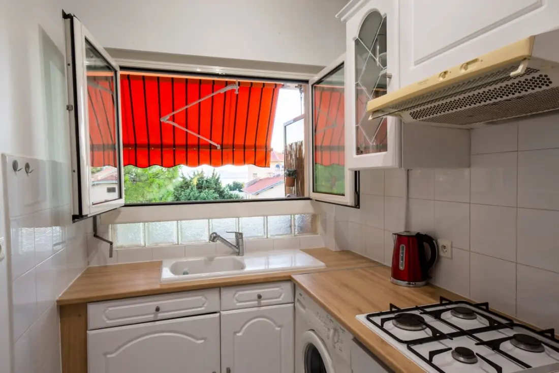 06k2 - Mooie airconditioning Studio - Terraszee Beeld